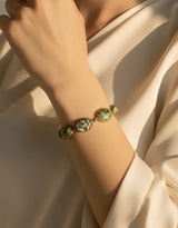 Eydis Elegant Gold Chain Bracelet with Ivory White Marble Beads & Emerald Green Print | Designer Bracelet for Women