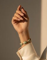 Eydis Elegant Gold Chain Bracelet with Ivory White Marble Beads & Emerald Green Print | Designer Bracelet for Women